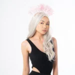 model wearing pastel pink goddess headband