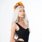 model wearing coachella music festival hair headband and color trend 2024