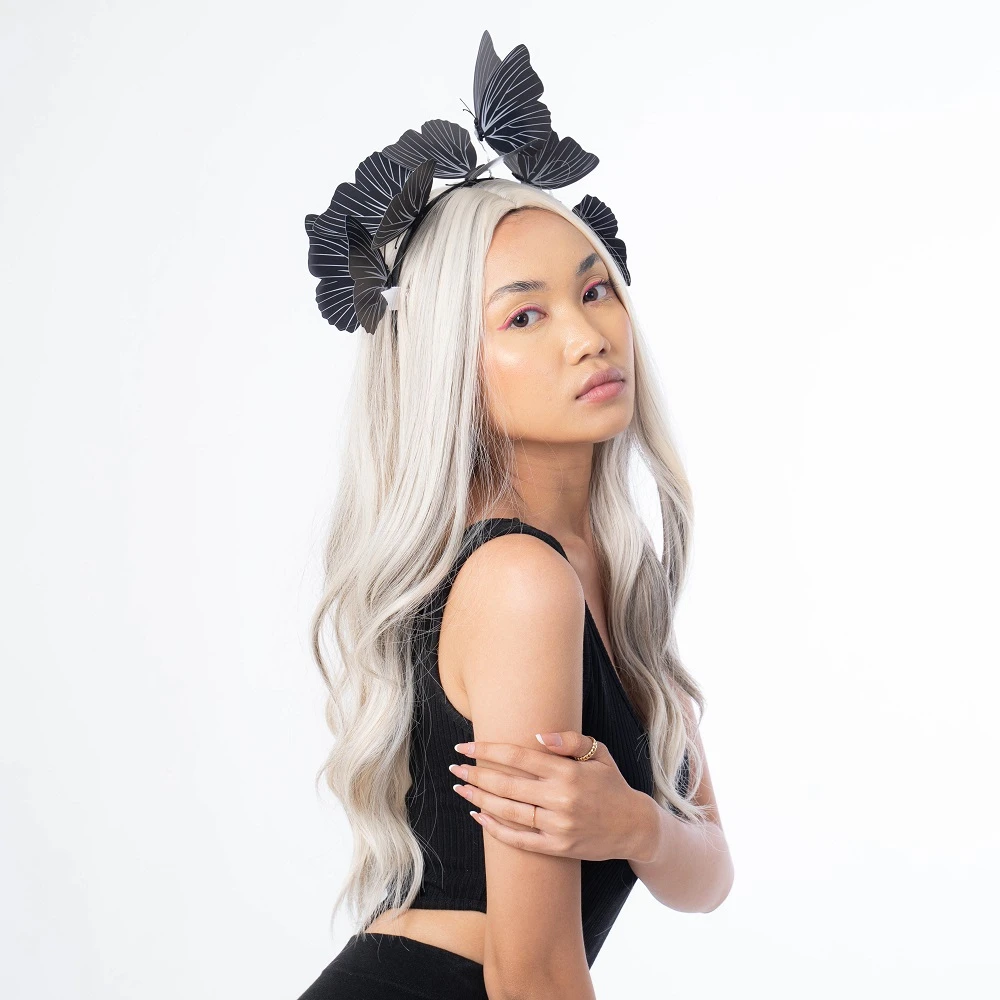 a model is showing how to make or wear wig appear natural