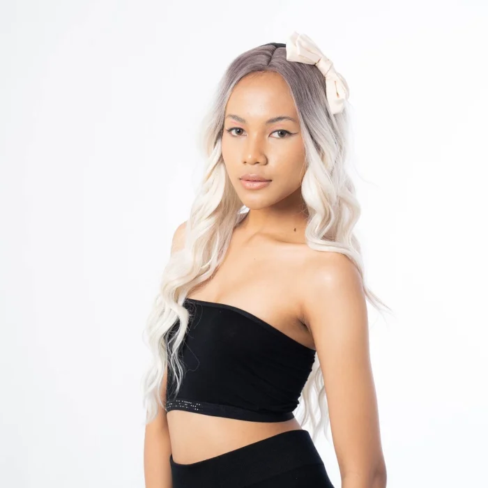 long platinum haired female model wearing party headband