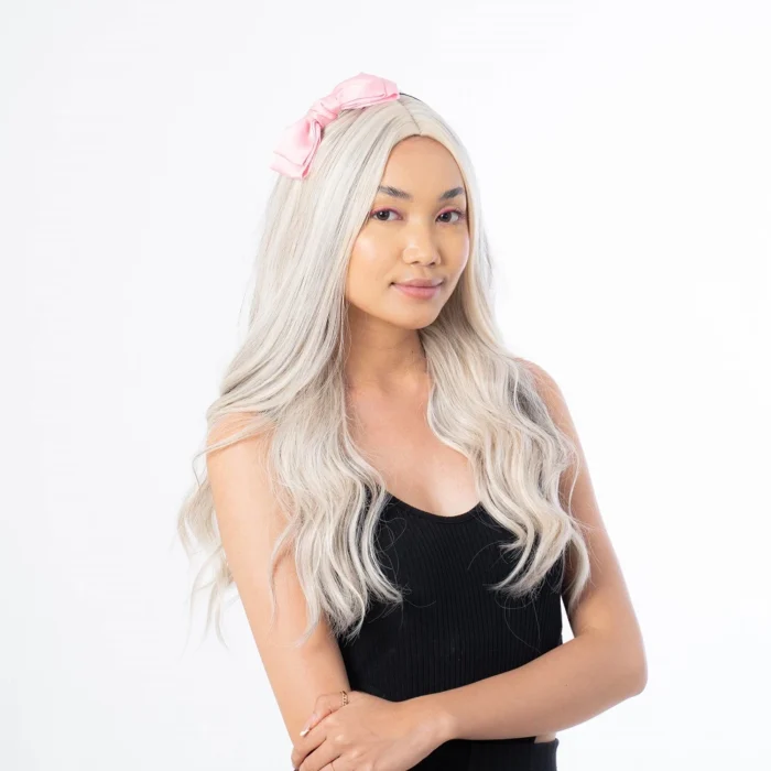 a female model wearing satin bow headband for a photoshoot